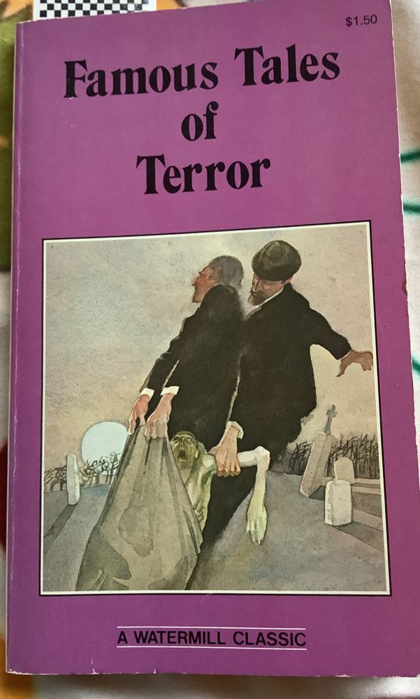 A purple softcover titled Famous Tales of Terror, with a picture of two men, dressed in black, dragging a pale corpse through a graveyard by its death shroud.