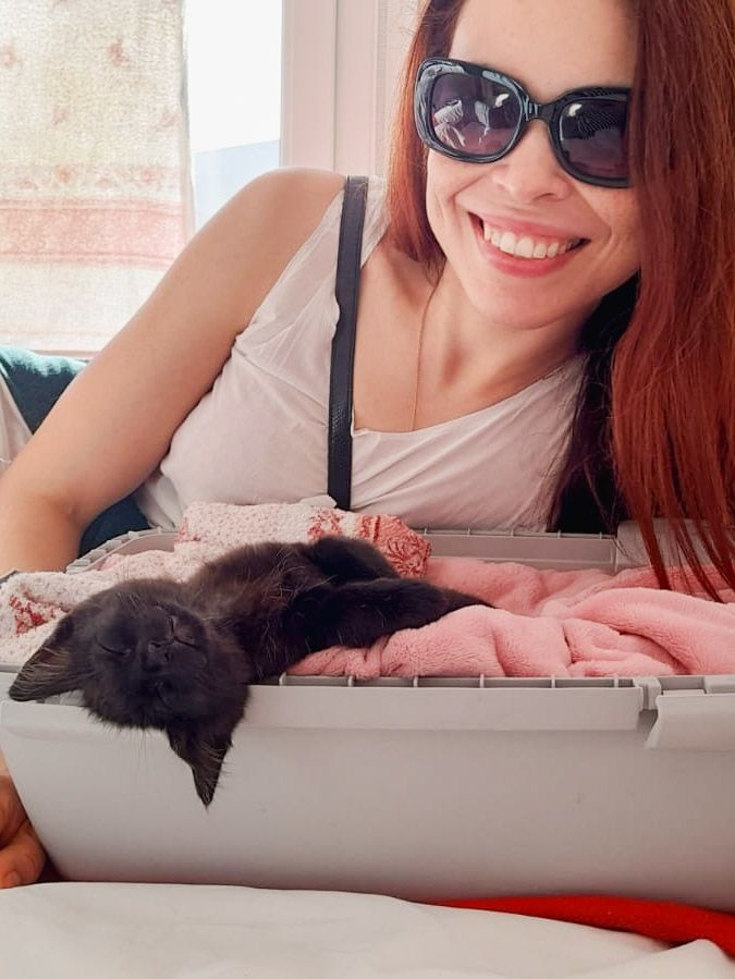 Cat and a ginger woman