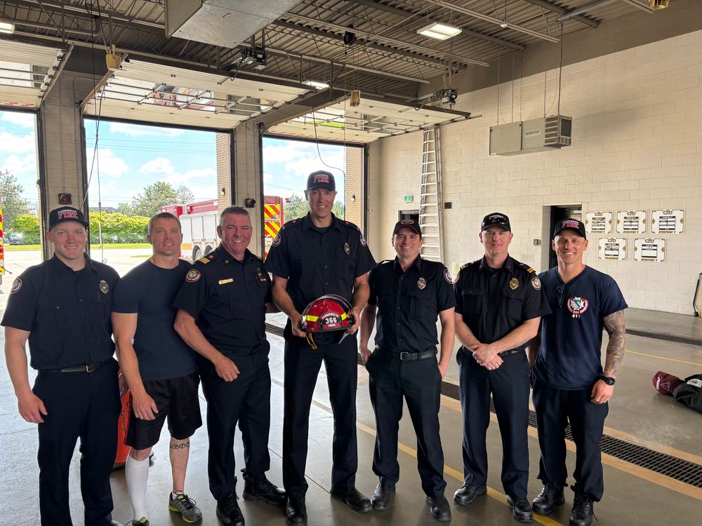 Training officer receives his red helmet on his promotion to Acting Captain 