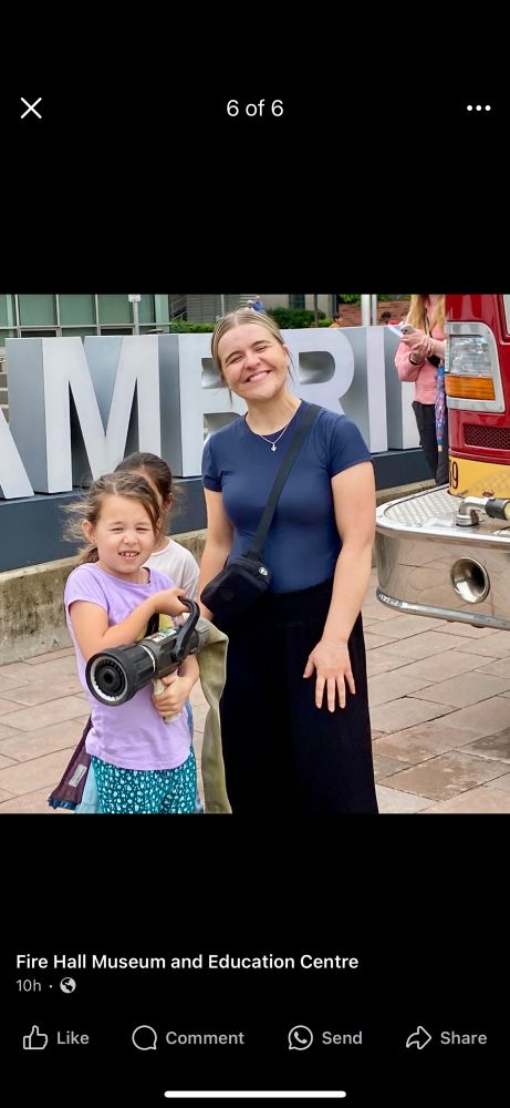 Child holding a fire nozzle 