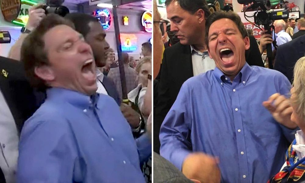 Ron DeSantis laughing, which looks more like a demented yawn