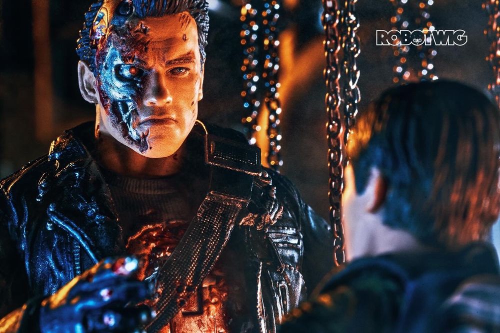Terminator talks to John in the steel mill. Surrounded by chains