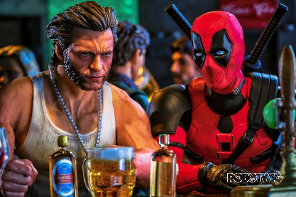 Deadpool talks to Wolverine at a bar. Wolverine has lots of drinks lined up