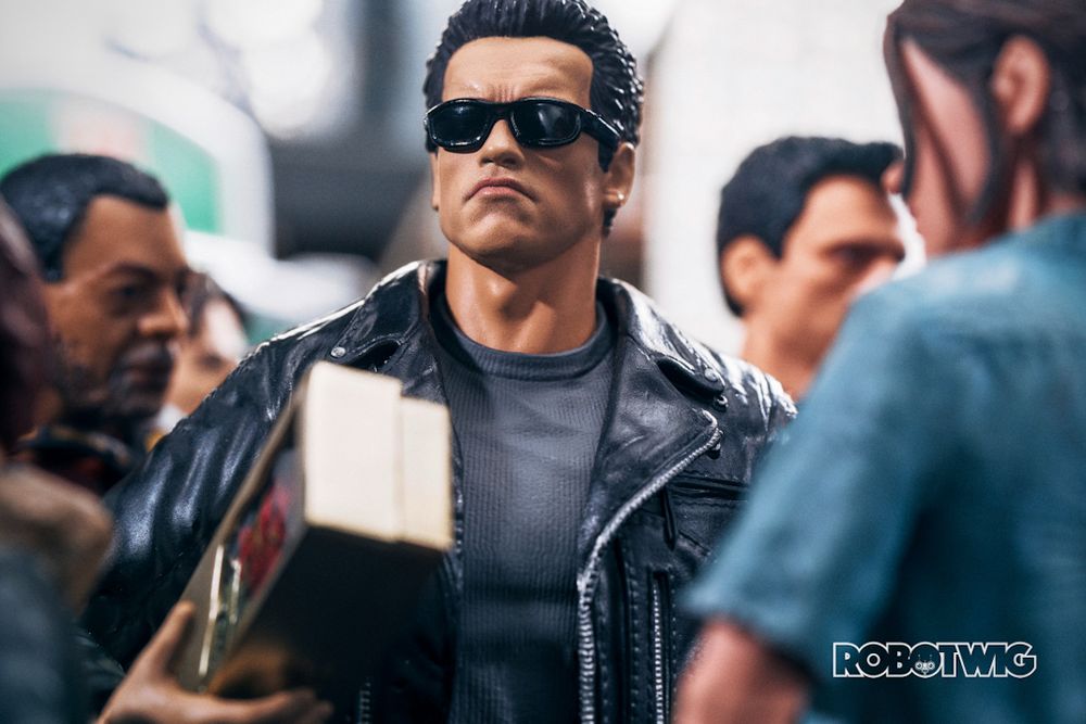 Terminator walks through a busy mall with a box of roses (flowers not chocolates)
