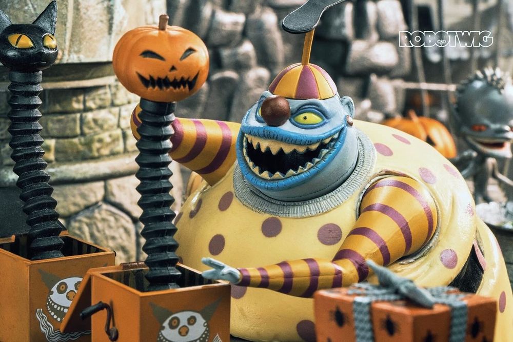 The Clown with the tear away face is on the production line in Halloween Town making Jack in the boxes. 