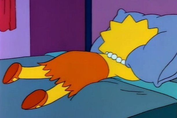 Lisa Simpson crying face down in a pillow 