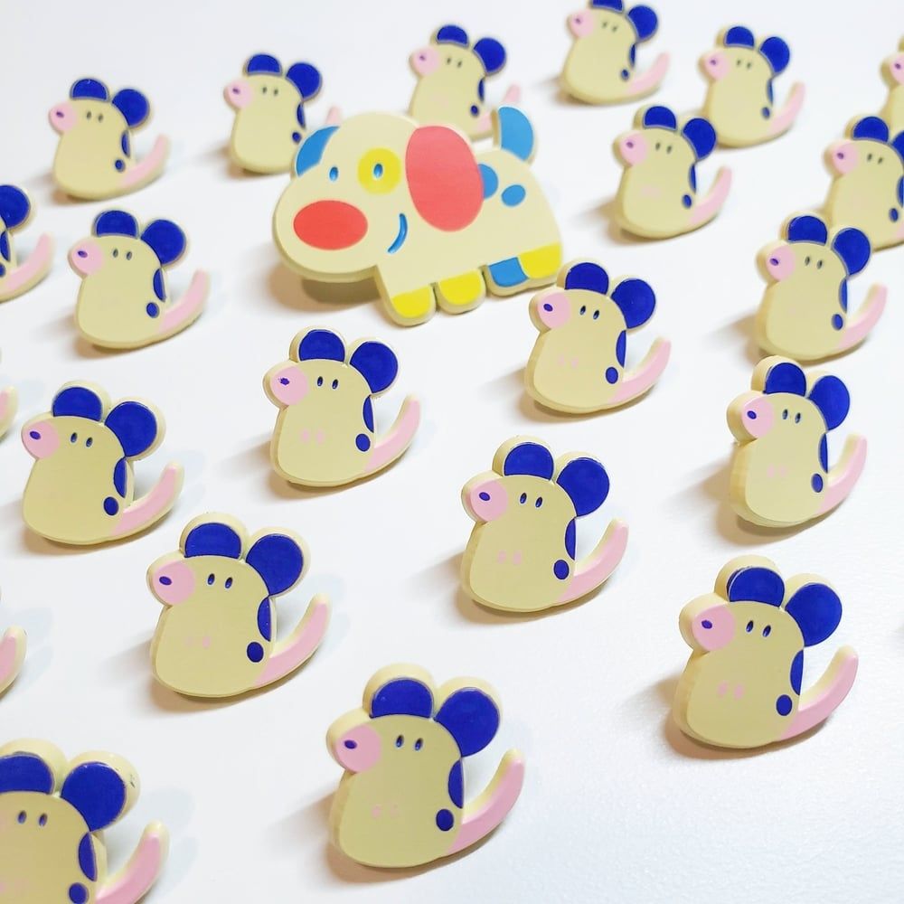 Enamel pins of a colorful mouse