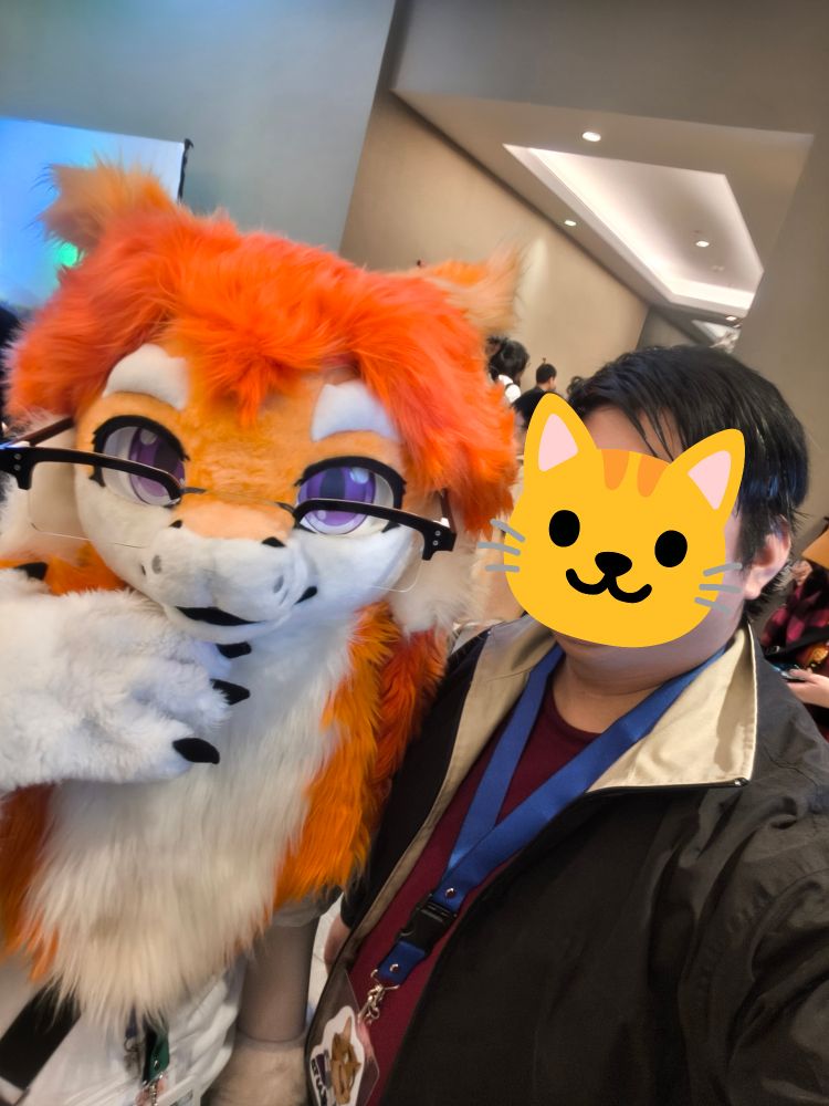 Picture of me and Meijer with their fursuit.