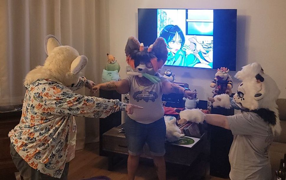 Three partial suiting furries point at each other, similar to the famous "Spider-Man pointing meme".