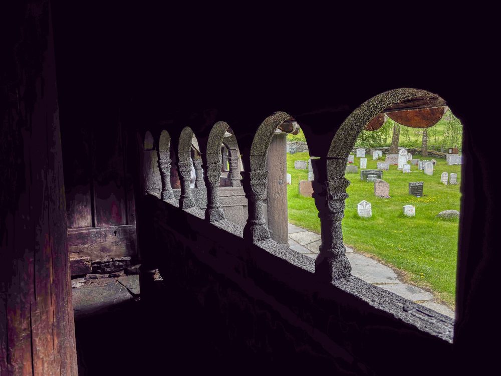 Looking out the covered passageway encircling the church, with the black tar protecting the exterior wood from the elements.
Borgund Stave Church, Norway
© 2025 Nathan Williams