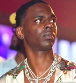 Young Dolph looking at people like they are disappointing and smell bad.