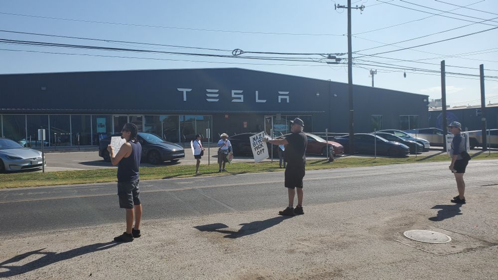 Tesla Takedown protestors. 