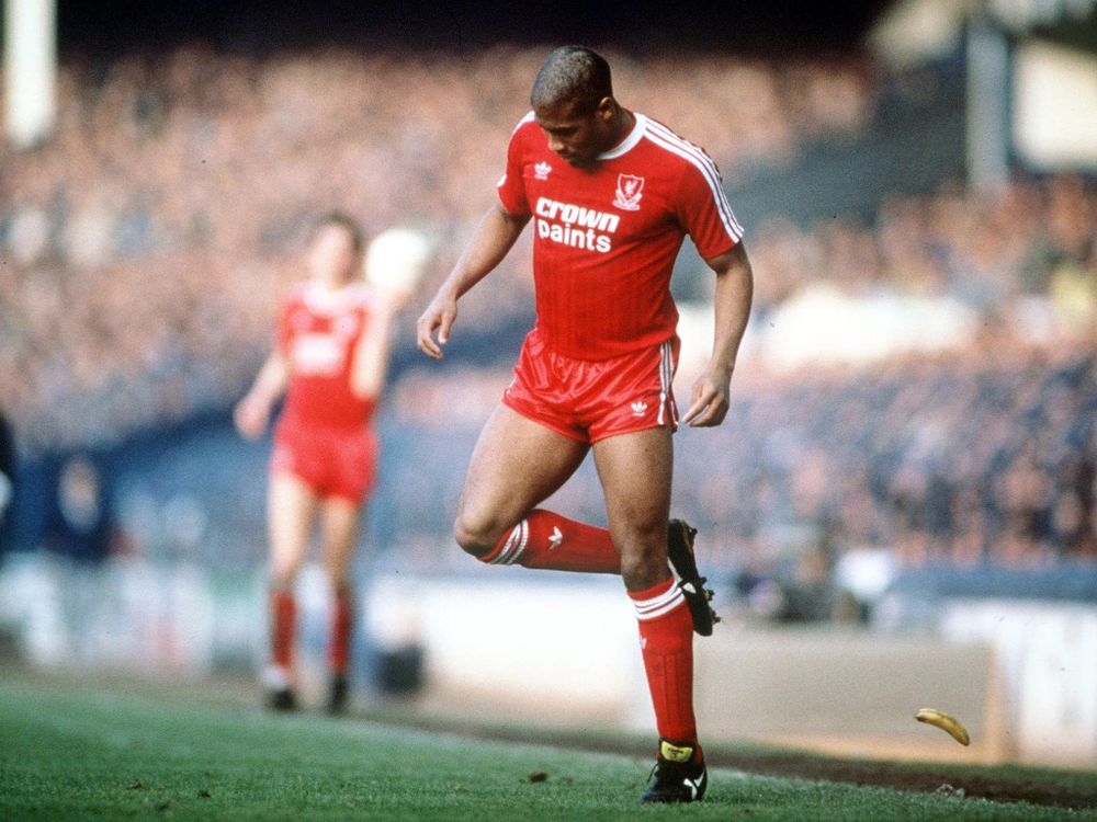 Bob Thomas's photo ofJohn Barnes backheeling a banana off the football pitch, Feb 1988