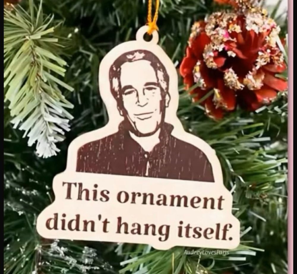 Picture of epstines hanging on a Christmas tree