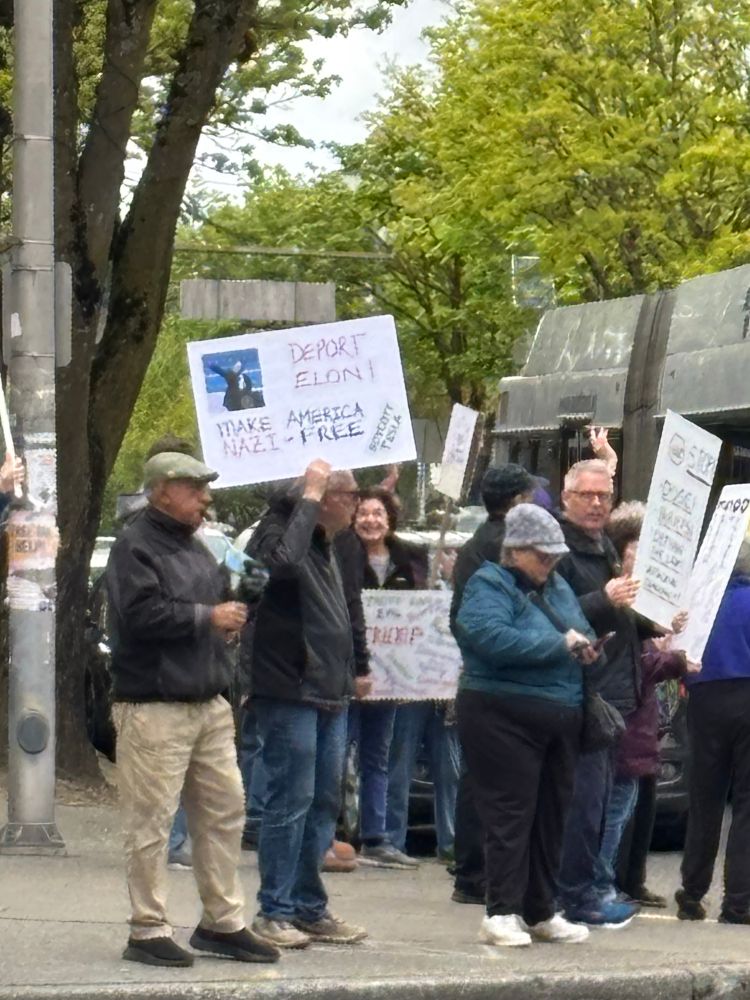 People holding signs