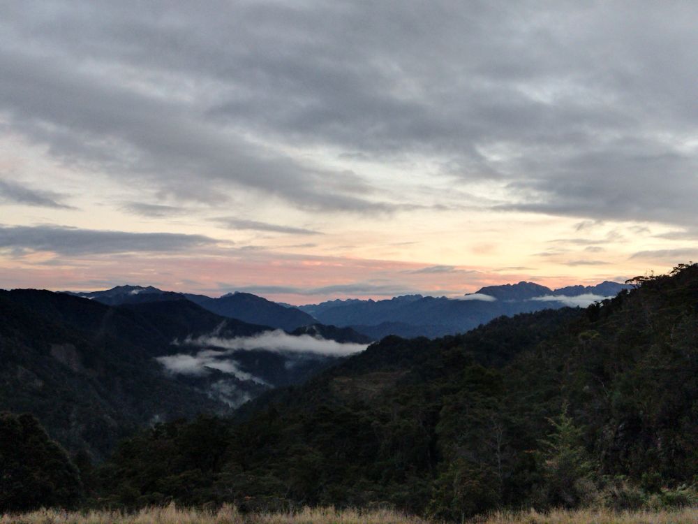 A sunset over mountains