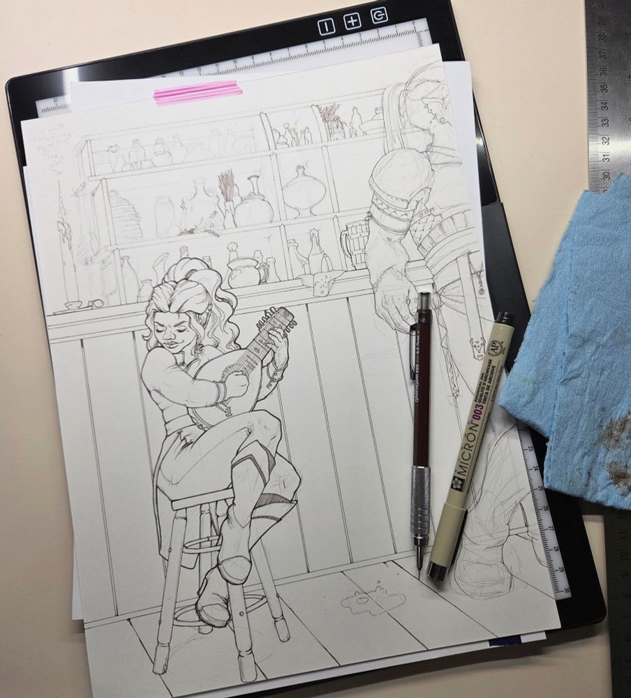 An overhead photograph of a drawing in ink with lots of pencil marks still present. The picture is of a halfling woman sitting at a bar, focused on tuning her lute in preparation for a performance.