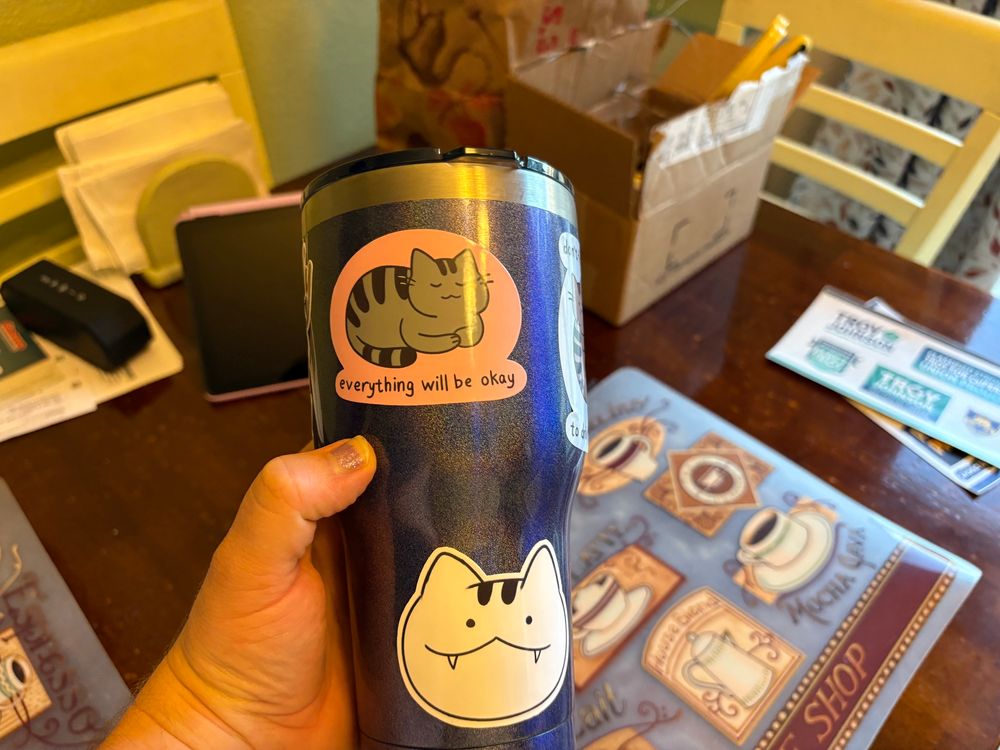 Cup with cute cat stickers
