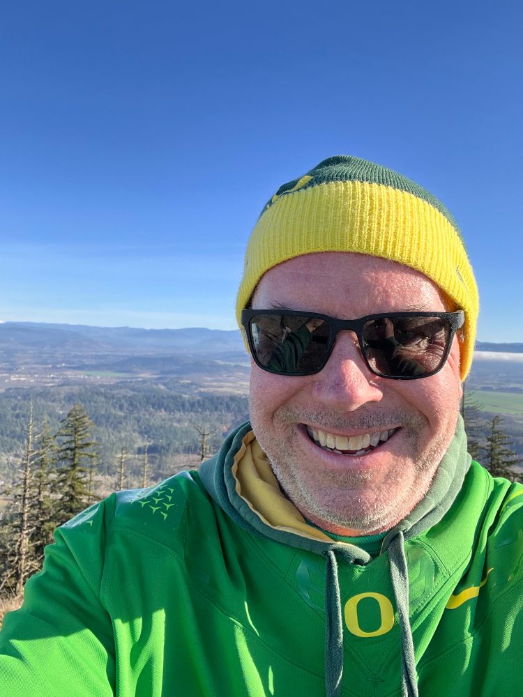Selfie of David Kaufer wearing sunglasses and Oregon Stocking hat 