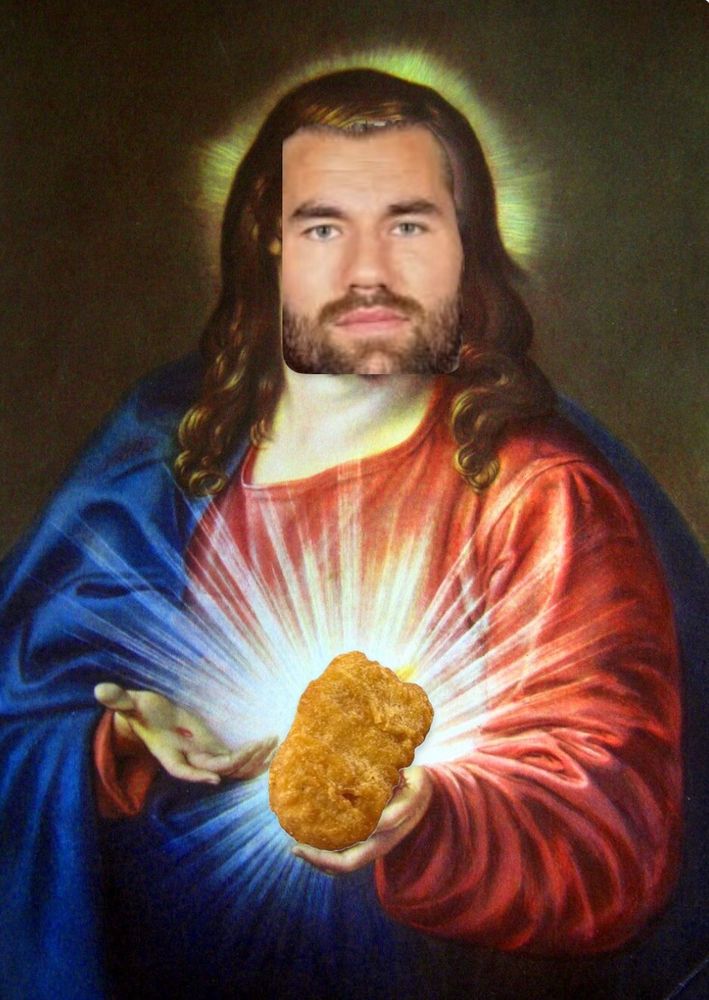 It’s Sacred Heart Jesus except he’s presenting a chicken McNugget instead of said Sacred Heart and also Tom Wilson’s face has been sloppily pasted on Jesus’ body