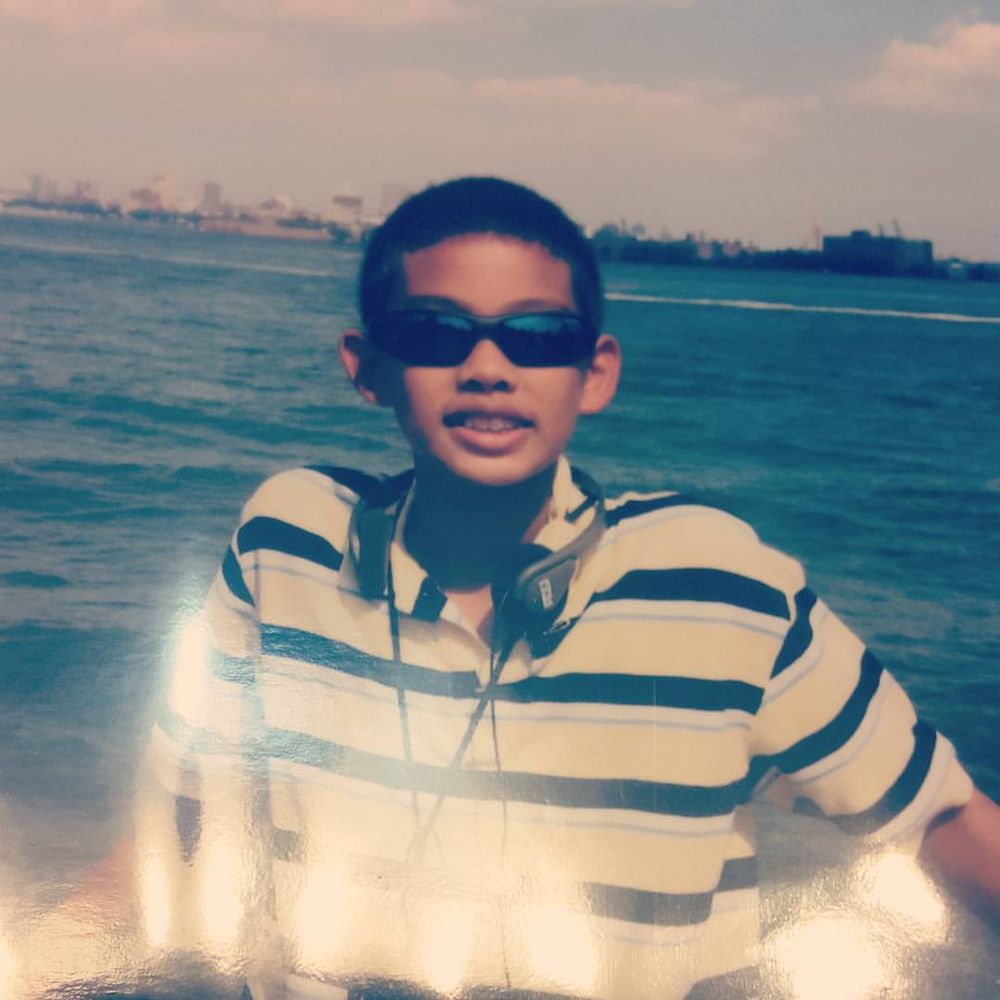 Child wearing sunglasses on the Staten Island Ferry