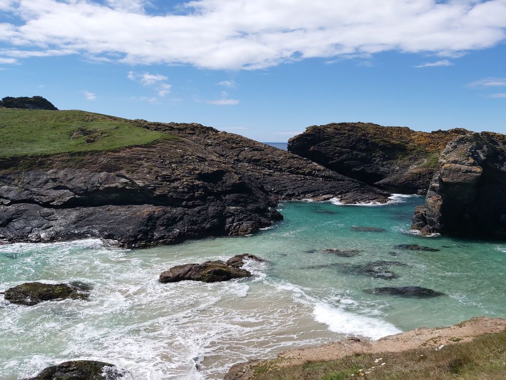 Turquoise sea and wild rocks in the sun. 
