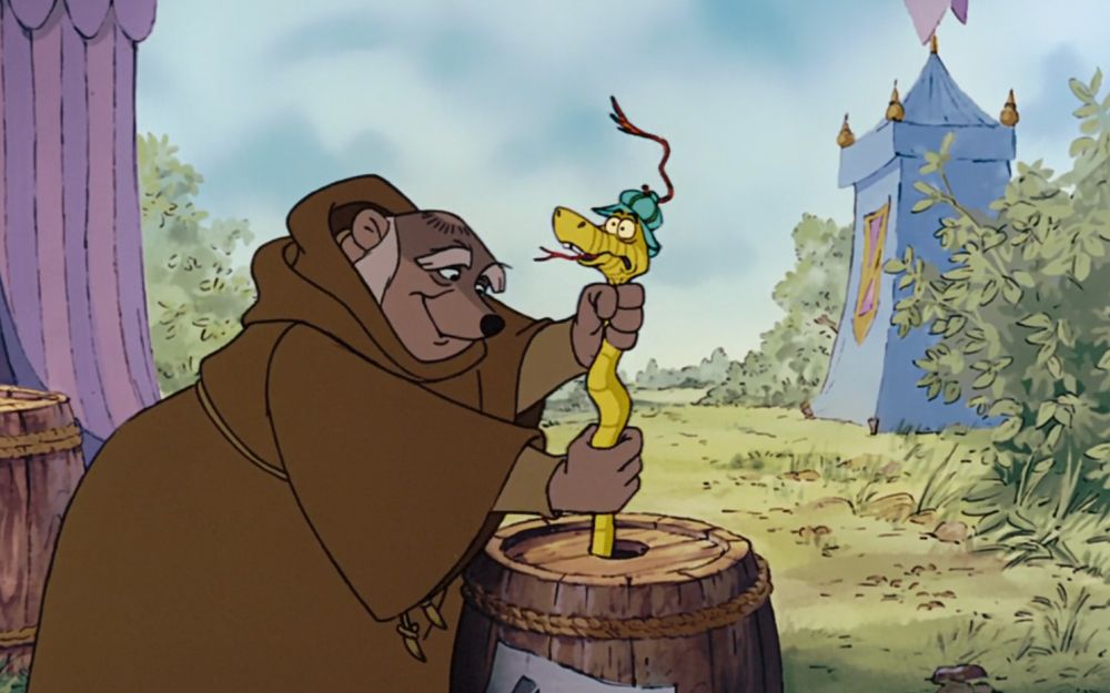 Friar Tuck cheerfully begins stuffing Sir His into said barrel