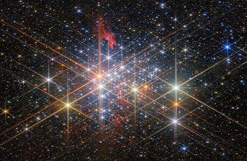 starbursts throughout space from stars 