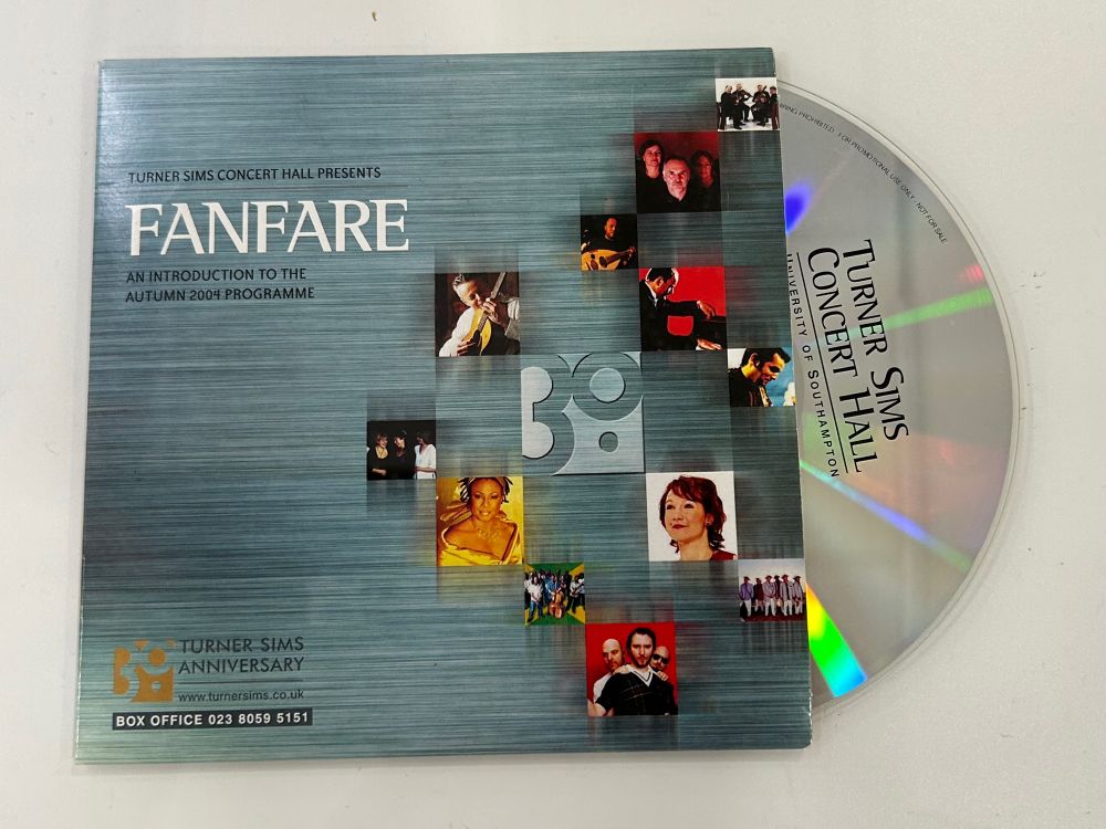 CD partially out of CD sleeve labelled Fanfare