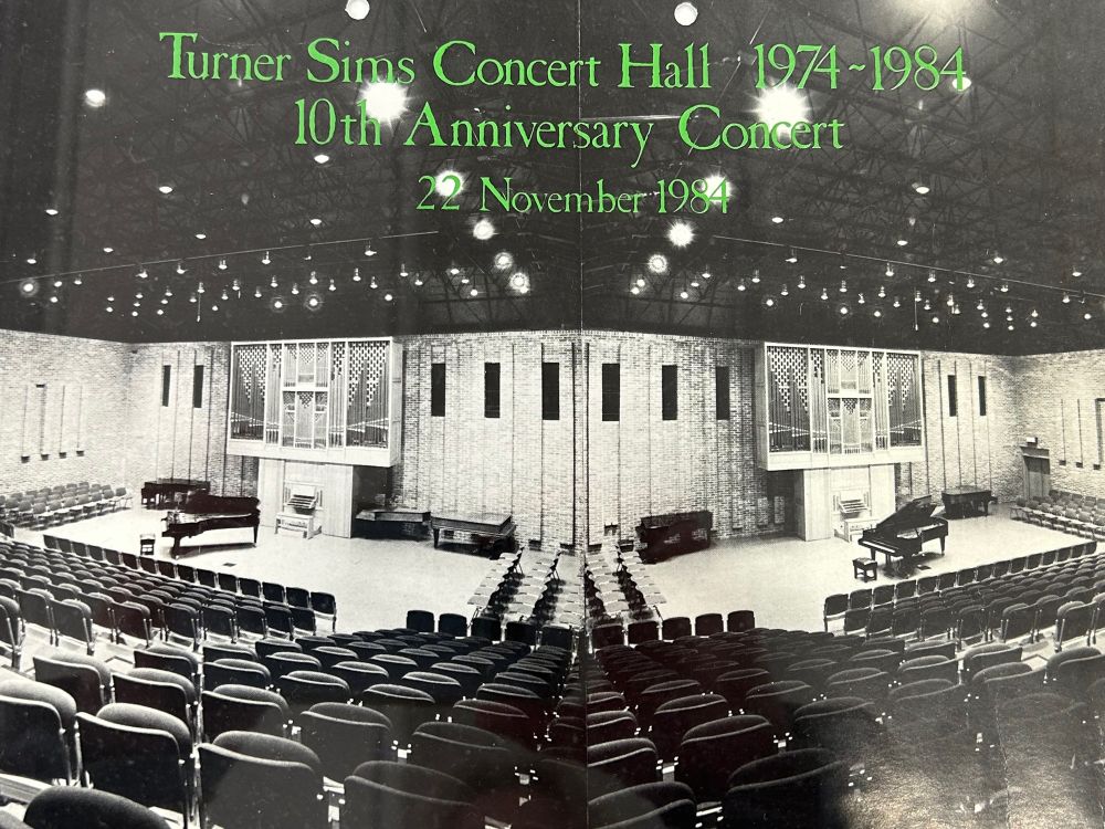 Black & white picture of concert hall on programme celebrating 10th anniversary concert 