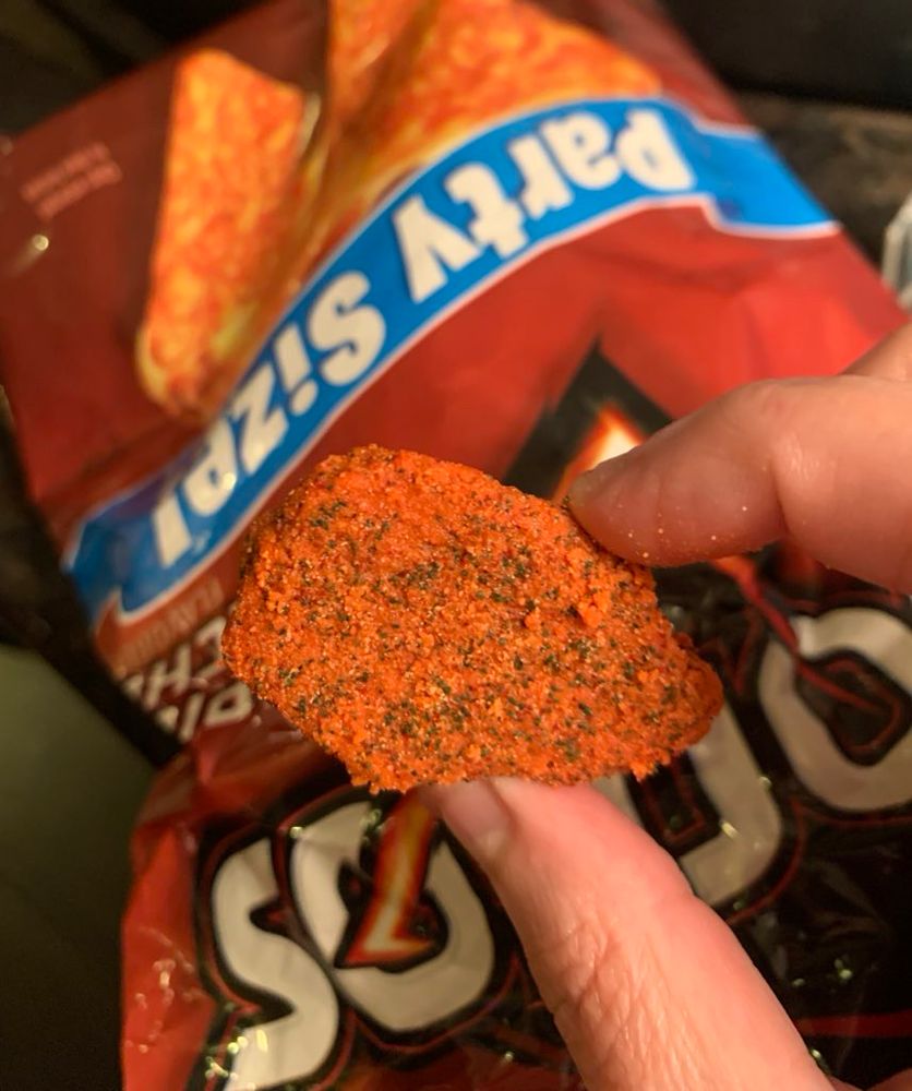 A densely packed nugget shaped lump of Dorito powder I pulled out of my bag of Doritos