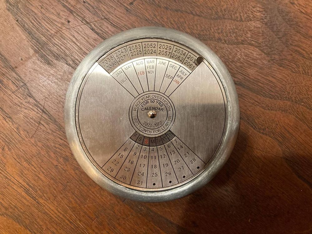 Image of small circular 50 year calendar 