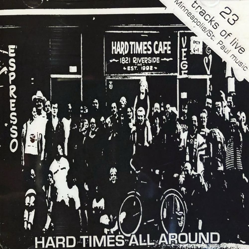 A xeroxed cd cover of a benefit album released for the Hard Times Cafe feature innumerable punks from around the twin cities gathered in front of the rundown Riverside store front, circa 2000.