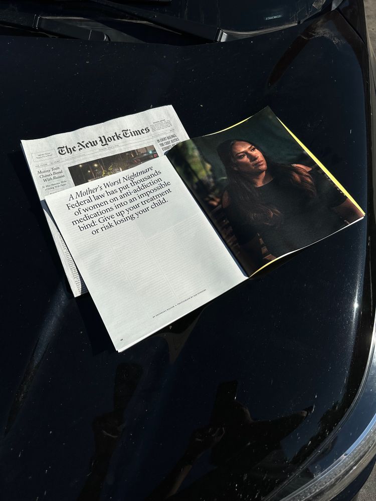 A magazine is open on the hood of a black car. The page reads “a mother’s worst nightmare. Federal law has put thousands of women in anti-addiction medications into an impossible bind: give up your treatment or risk losing your child.” On the obverse page is my portrait of Jade. She’s looking away, into the setting sun, wondering about her daughter.