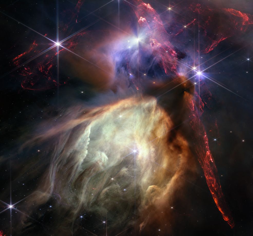 This James Webb Telescope image captures the Rho Ophiuchi cloud complex, situated approximately 390 light-years away from Earth. Webb's close proximity to this star-forming region allows for an unprecedented level of detail without any foreground stars obstructing the view. The image, resembling an impressionistic painting, depicts around 50 young stars with masses similar to or smaller than that of the Sun.