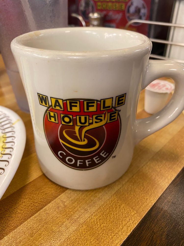 A Waffle House coffee cup