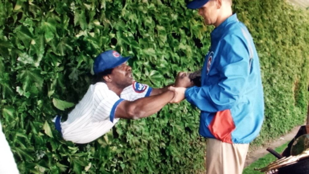 Andre Dawson pulled out of the Wrigley Field ivy by Kerry Wood in a State Farm commercial.