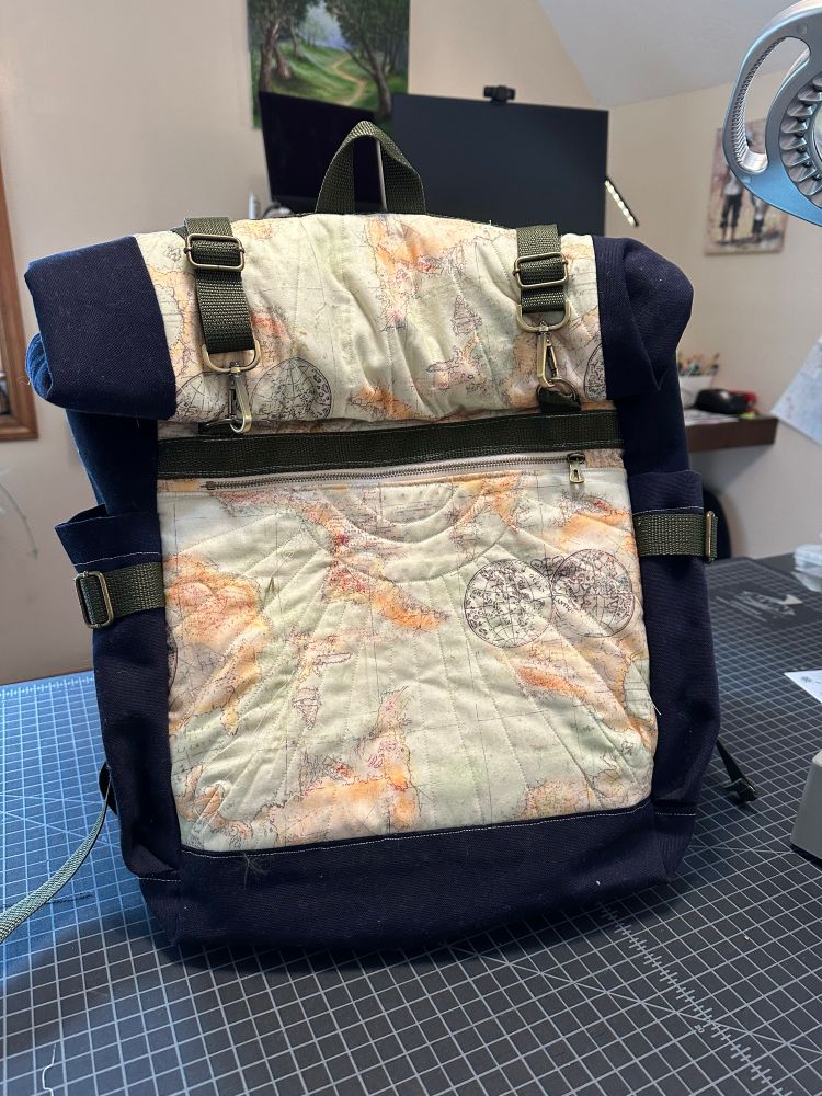 Elevenses backpack navy sides and map quilted front 