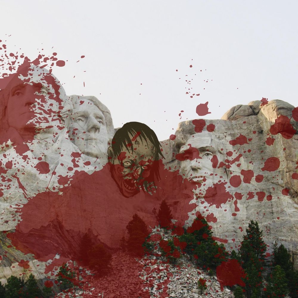 Background of Mount Rushmore. Third President has been replaced with zombie head. Semi-transparent red Blood splatter across the entire image