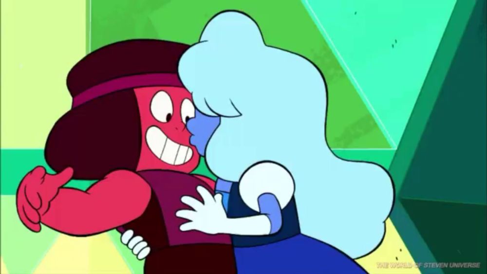 a cartoon of ruby and sapphire hugging each other from steven universe