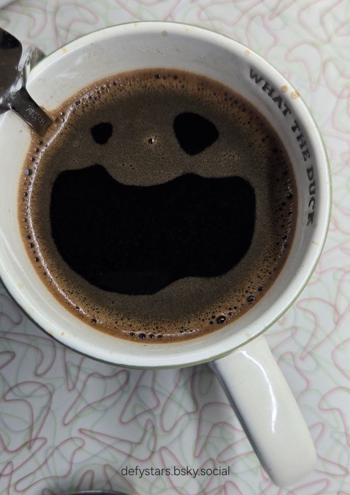 My coffee mug this morning, the bubbles separated along the edge of the cup to make a face that looks like it's screaming