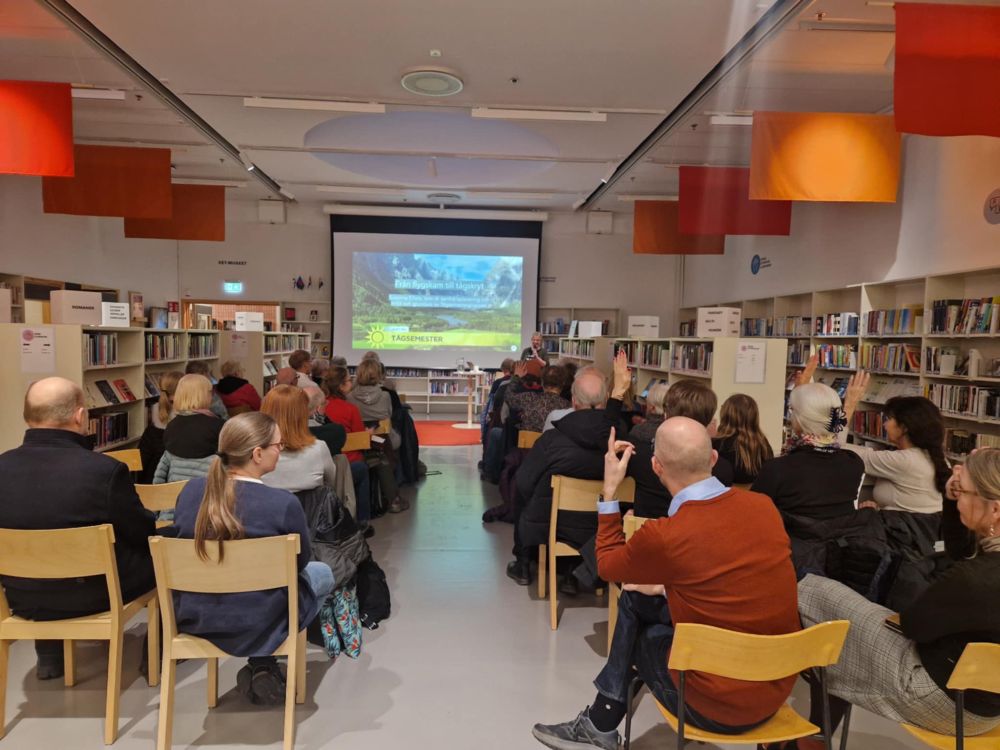 People listening to a lecture about traincation