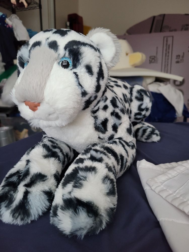 Snow leopard plush toy