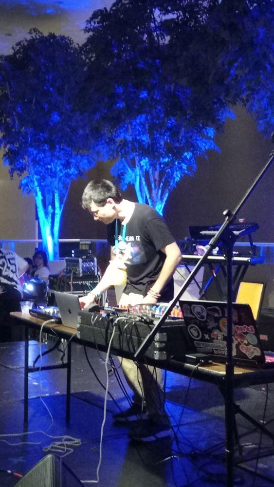 Musician Foozogz performing onstage at TrotCon 2025
