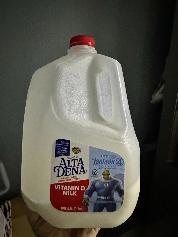 gallon of milk with a picture of the thing from fantastic four on it