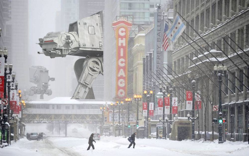 Fictional scene of people trudging through the snow across a snowed in Avenue in downtown Chicago. 

Massive Star Wars Imperial Walkers can be seen in the background near the “L” — at least five stories high — trudge through the snowy streets searching for people to kill. 