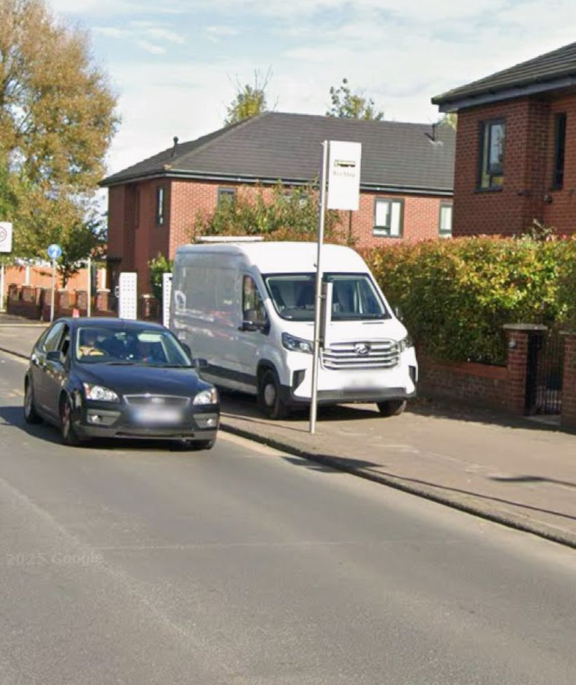 Van obstructing pavement