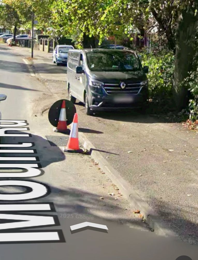 Van obstructing pavement