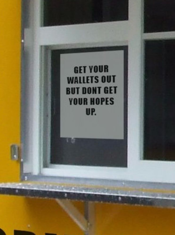 A sign that says ‘get your wallets out but don’t get your hopes up’.