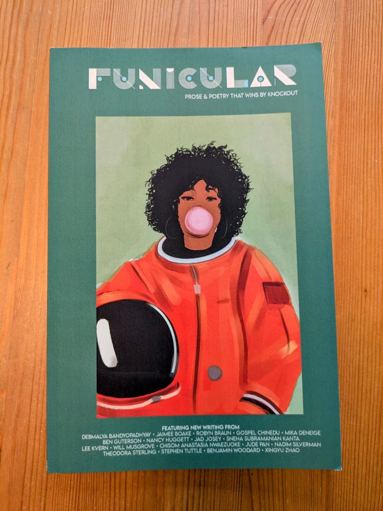 Cover of Funicular magazine. Artwork depicts a female astronaut in an orange space suit blowing a pink bubble gum bubble.
